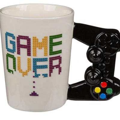 China Viable Game Over Printing Ceramic Coffee Mug , Ceramic Game Pad Handle Coffee Mug for sale