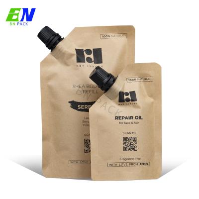 China Barrier customs printed reusable nylon laminated material kraft paper spout pouch for liqiud for sale