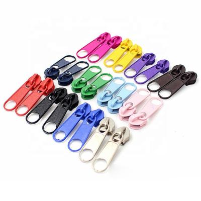 China Fashion Metal Zipper Rainbow Zipper Nickel Free Nylon Garment Zipper Pullers Custom Metal Zipper Pulls for sale