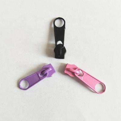 China Nickel Free Garment Accessories Zipper Slider Customized Plastic Zipper Pulls Head for sale