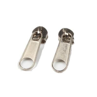 China Customized Nickel Free Fashion Non Lock Zipper Puller And Zipper Slider Gold For Handbags for sale