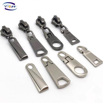 China Nickel Free Metal Custom Zipper Ends Key Zipper Sliders Puller For Handbags And Garment for sale