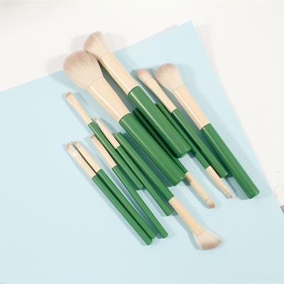 China Fan Brush Handle Wooden Goat Hair Full Set Eye Makeup 12pcs New Marble Magic Rotating Brush for sale