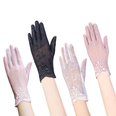 China Sun Protection Fashion Sun Protection UV Proof Women Fashion Lead Lace Fabric Party Wedding Bridal Gloves for sale