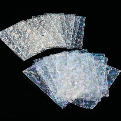 China Waterproof Dustproof Premium Clear Heart Stars Holographic Card Sleeves For Trading Sports Playing Card for sale