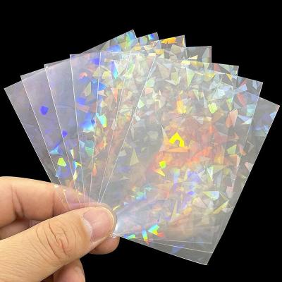 China Waterproof Dustproof Premium Clear Heart Stars Holographic Card Sleeves For Trading Sports Playing Card for sale