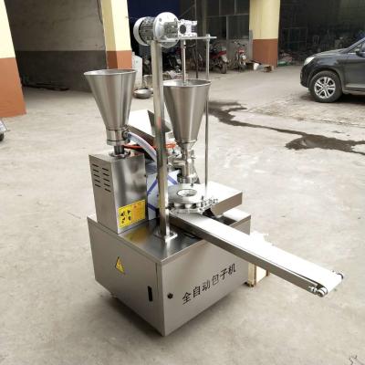 Chine La Chine complètement automatique a cuit la machine à la vapeur bourrée de petit pain avec la double trémie à vendre