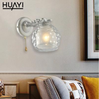 China HUAYI High Performance Metal Glass Contemporary Simple Modern Style E14 60w Bedroom Bathroom Led Wall Lamp for sale