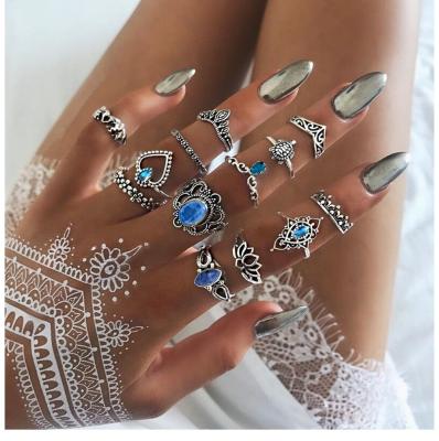 China Simple She Funs Wholesale Vintage Elegant Mens Womens Silver Plated Alloy Crown Ring 13 Piece Combination Ring Set With Blue Stone for sale