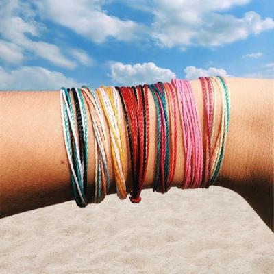 China Friendship Creative Colorful Waterproof Adjustable Wire Cord Rope Bracelet Waterproof Woven Handmade Jewelry For Women for sale