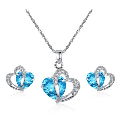 China Luxury Environmental Friendly Crystal Silver Necklace Set Double Heart Zircon Sapphire Jewelry Set Blue Crystal Pendant For Women for sale