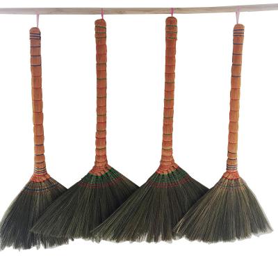 China Eco-friendly Nipa Natural Straw Grass Broom With Wooden Handle Stick for sale