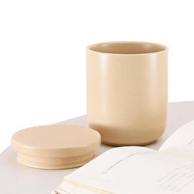 China Wholesale Home Decoration Wedding Glazed Ceramic Candle Jar Vessels With Ceramic Lid Ceramic Storage Jar For Soy Wax Scented Candle Making for sale