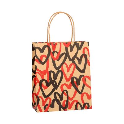 China Recyclable Ready Goods Kraft Paper Packing Bag Making Machine with Printing Hearts T Shirt Bag for sale