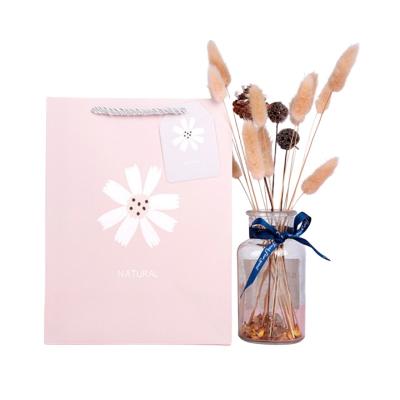 China Recyclable Daisy petals wholesale cute cardboard flower gift bag for floral paper gift bags for sale