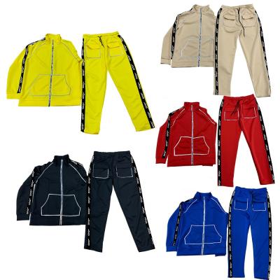 China Breathable Custom Nylon Jacket Reflective Stripe Logo Spring Summer Thick Warm Zipper 2 Piece Sets Up Jogging Tracksuit For Women Men for sale