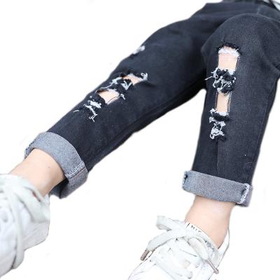 China Wholesale good quality viable new design teenage hole ripped black pencil youth girl jeans kids pants slim kids trousers for sale