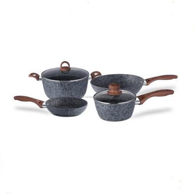 China Durable Bakelite Handle Pentole Milk Pans Cooking Pot Set Nonstick Granite Cookware Casserole Dish Set for sale