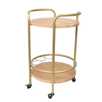 China Elegant carefully selected golden materials soild wooden shelevs metal frame bar serving carts for sale