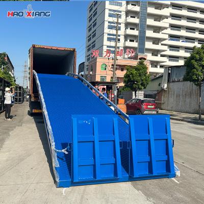 China Manual Adjustable Mobile Forklift Ramp 10t Hydraulic Dock Leveler for sale