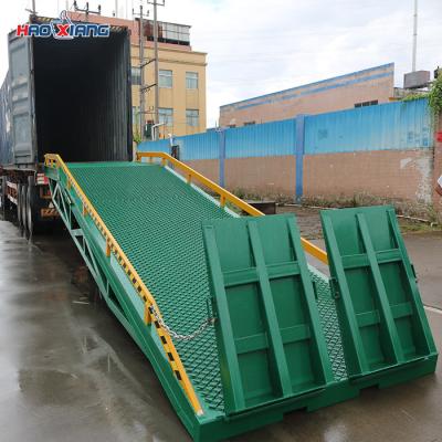 China Diamond Mesh Hydraulic Dock Ramp 10000kg Portable Loading Dock Platform for sale