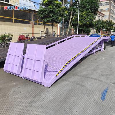 China Purple Portable Truck Dock Ramps 20000kg Temporary Loading Dock for sale