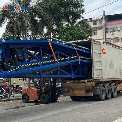 China Manual Portable Forklift Ramp 1.2m-1.68m Height Adjustable Loading Dock Ramp for sale