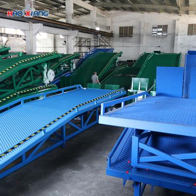 China 11M Hydraulic Dock Leveler 10T Container Unloading Ramp Mobile Forklift Ramp for sale