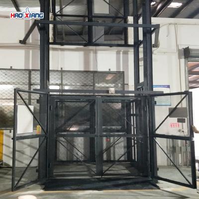 China 2000 Kg Hydraulic Cargo Lift 1-7 Floors Height Freight Platform Lift for sale