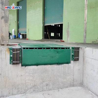 China Warehouse Hydraulic Dock Plate 8T-20T Metal Loading Dock Ramp for sale