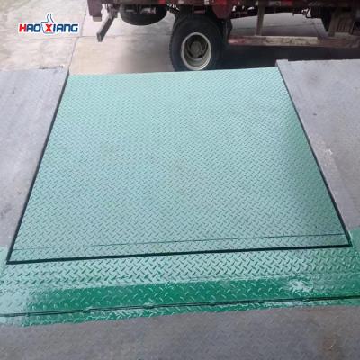 China Unloading Hydraulic Dock Plate 20 Ton Dock Leveling Bridge for sale