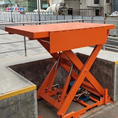 China Stationary Electric Hydraulic Scissor Lift 1000kgs Motorised Lifting Platform for sale