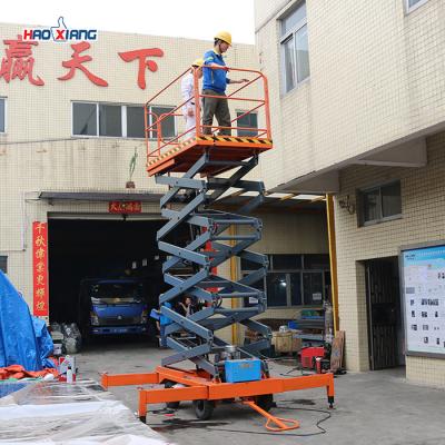 China 1000 Lbs Load Capacity Electric Scissor Lift Table for Industrial Use for sale