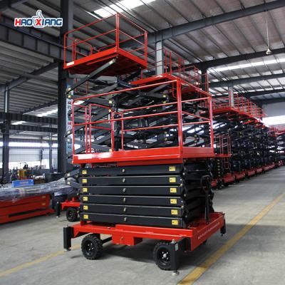 China 660lbs Motorized Scissor Lift Table Steel Electric Platform Lift Table for sale