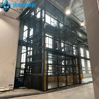 China 10m High 500kg-20000kg Industrial Goods Lift 2 Storey Hydraulic Cargo Elevator for sale