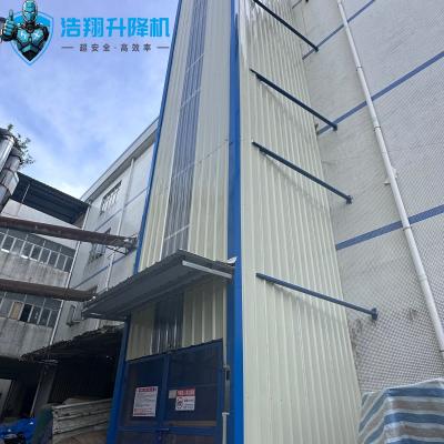 China 10m High 500kg-20000kg Industrial Outdoor Goods Lift 2 Storey Hydraulic Cargo Elevator for sale