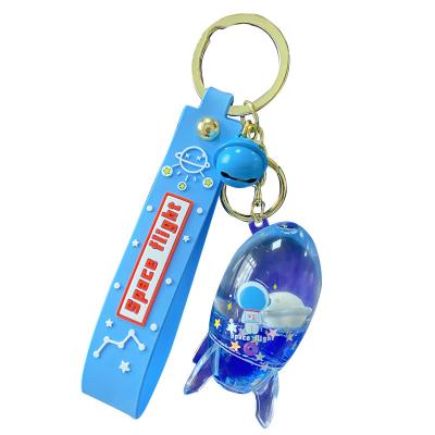 China Cute Key Chain Liquid Cartoon Astronaut Oil Fashion Dropshipping Floatation Lollipop Bucket Key Chain Couple Car Bag Pendant Charm Keyfob Gi for sale