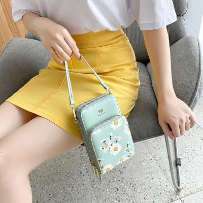 China 2021 Small Daisy Print Women's Mini Version Large Capacity Mobile Phone Bag Korean Multifunctional Mini Bag Messenger Shoulder Bag for sale