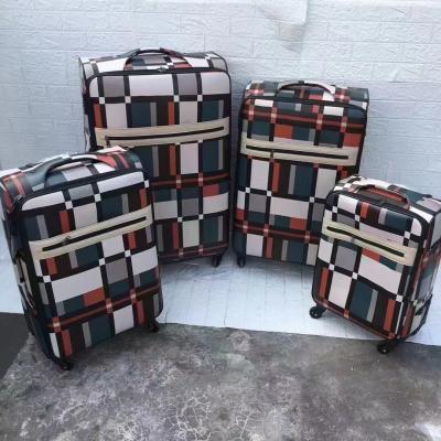 中国 Leather Luggage Sets Plaid Pattern Mixed Color PU Factory Supplying Waterproof High Strength And Compression Resistant 販売のため