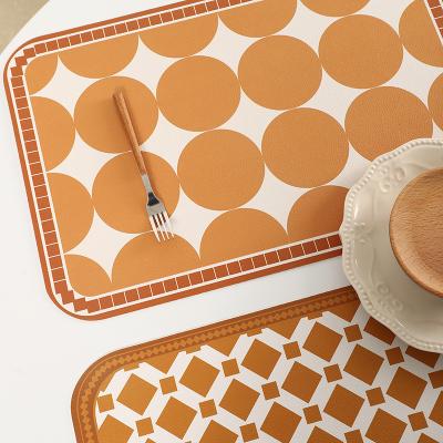 China Sustainable Custom Kitchen Dining Table Mat Round Square Faux Printed PU Leather Place Mat for sale