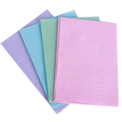 China Dental Consumable Materials Regional Dental Colored Disposable Dental Bib for sale