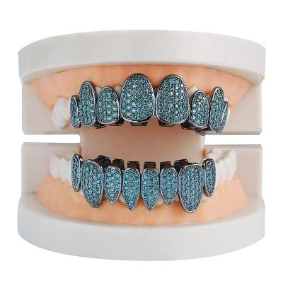 China Custom Top and Bottom Teeth Grillz CZ Diamond Iced Out Black Teeth Grillz Green Hip Hop Grillz for sale