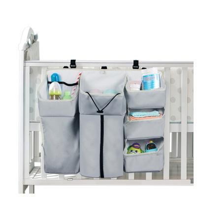 China Sustainable Foldable Amazon Baby Crib Organizer, Baby Essentials Hanging Crib Diaper Organizer for sale