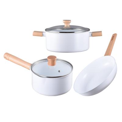 China Viable Pure White Ceramic Pot Set Non Stick Grain Wood Handle Frying Pan Milk Pots Various Sizes Soup Filters Double Sided Ceramics for sale