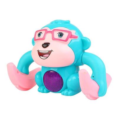 China Modern baby girl baby boy singing monkey rolling over toy monkey puzzle rollover voice control electric crawling toy for sale