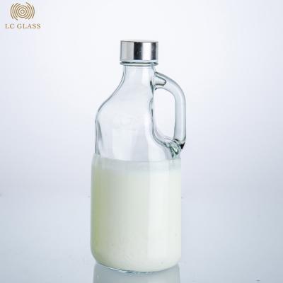 China Wholesale Beverage Milk Glass Bottle 1 Liter With Metal Lid for sale