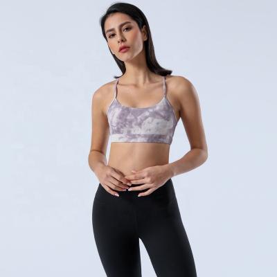 China Breathable Ladies Sexy Gym Clothes Cotton Elastic Soft Top Support Tie Light Dye Printed Racerback Yoga Sports Bra for sale