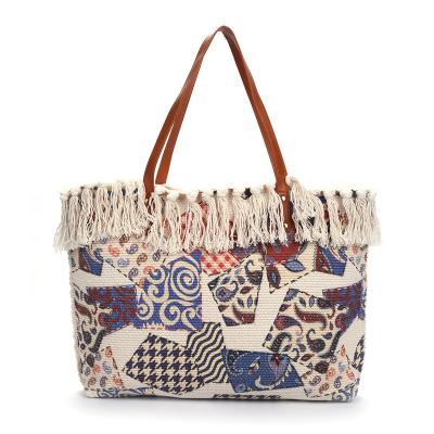 China Fashion Fashion Trends Large Tassels Handbag Bright designs Leisure Travel Ladies Woven Handbag for sale