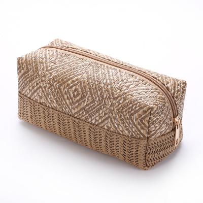 China Lightweight Two-tone Boho Embroidered Cosmetic Bag PP Straw Small Pouch Beauty Ladies Travel Toiletry Makeup Bag for sale