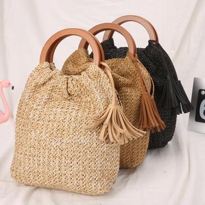 China Fashion Round Handle PP Straw Handbag Two Tassels Pretty Girls Daily Used Handbag for sale